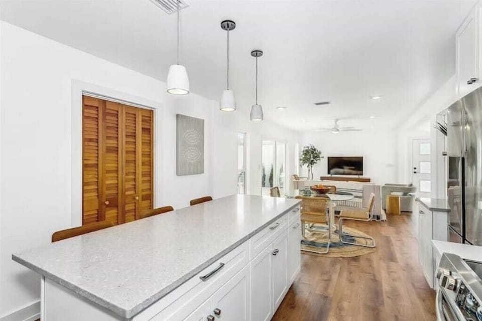 View from Kitchen to Dining and Living Room Areas