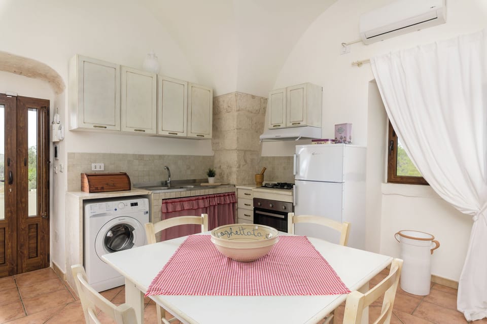 Apartment, Garden View | Private kitchen | Espresso maker, electric kettle, dining tables