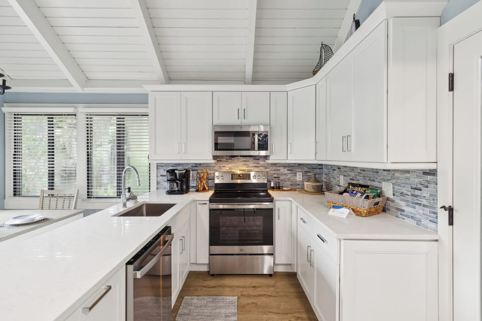 Completely renovated in 2024, the kitchen boasts all-new cabinets, countertops, and top-shelf appliances.