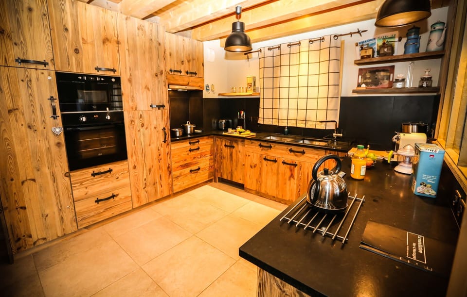 The fully-equipped kitchen features all the amenities you'd need to make a delicious meal.
