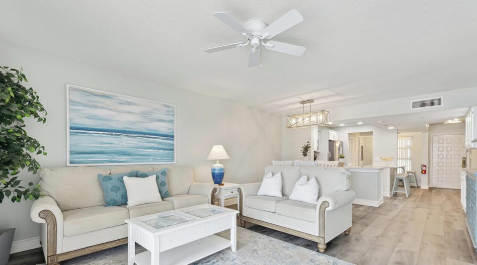 Cozy coastal-inspired living room with comfortable seating.