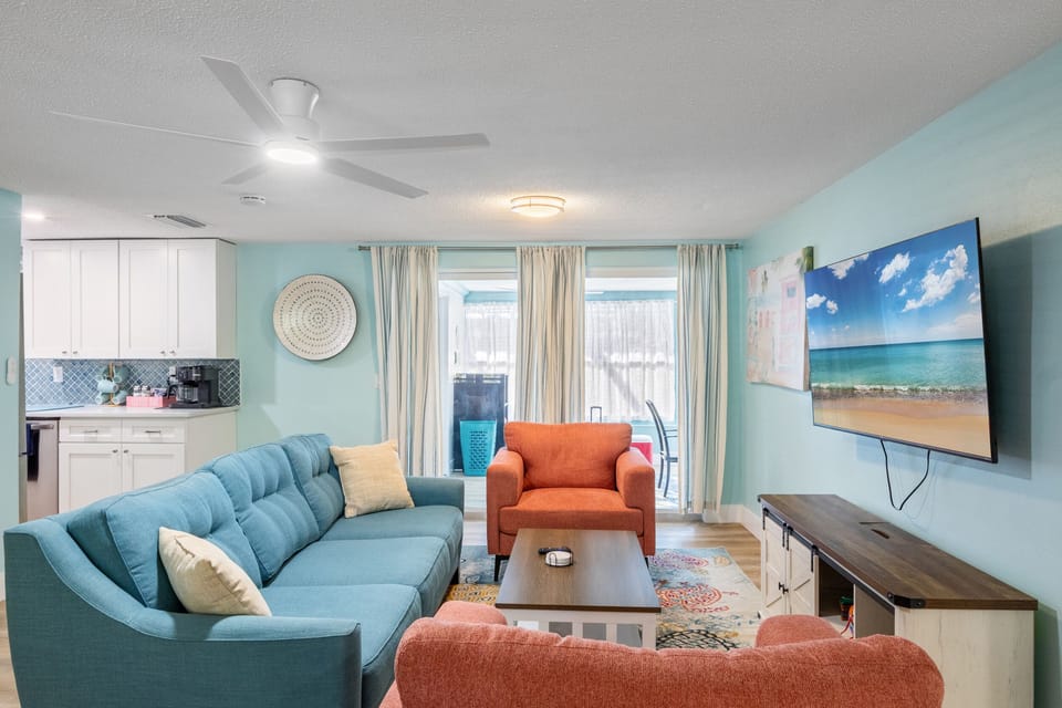 Home features open concept living, dining and kitchen areas as well as lanai
