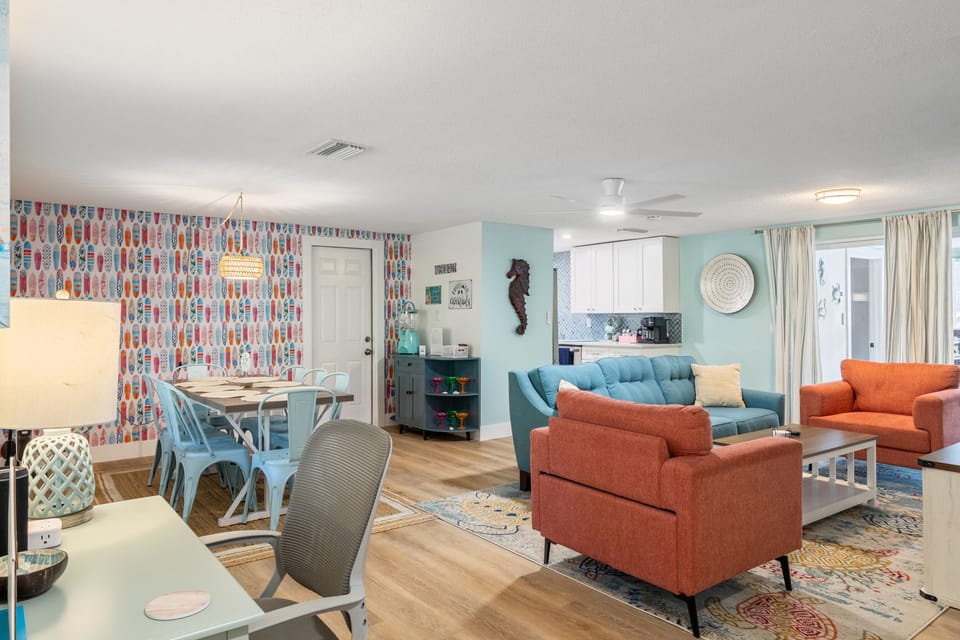Home features open concept living, dining and kitchen areas as well as lanai