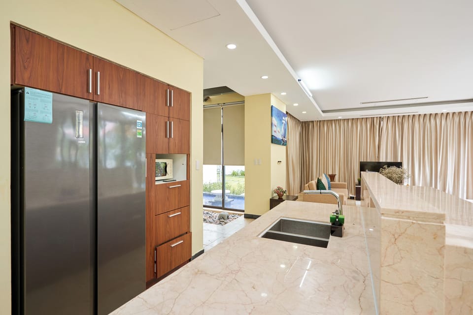 Luxury Villa, 4 Bedrooms | Private kitchen | Fridge, shared microwave, oven, stovetop