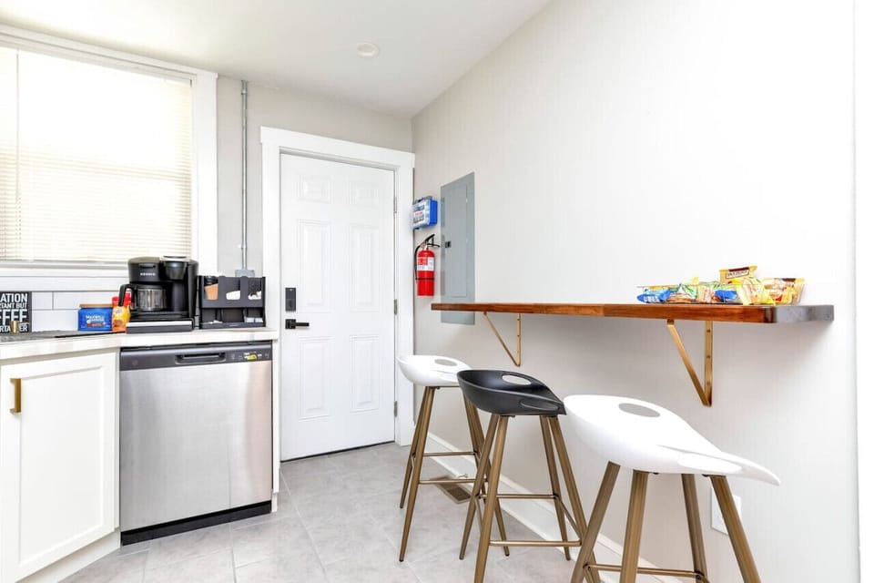 Fully equipped! Cook with ease! Featuring a dual coffee maker, stove, dishwasher, microwave, and all the essentials for your culinary adventures.