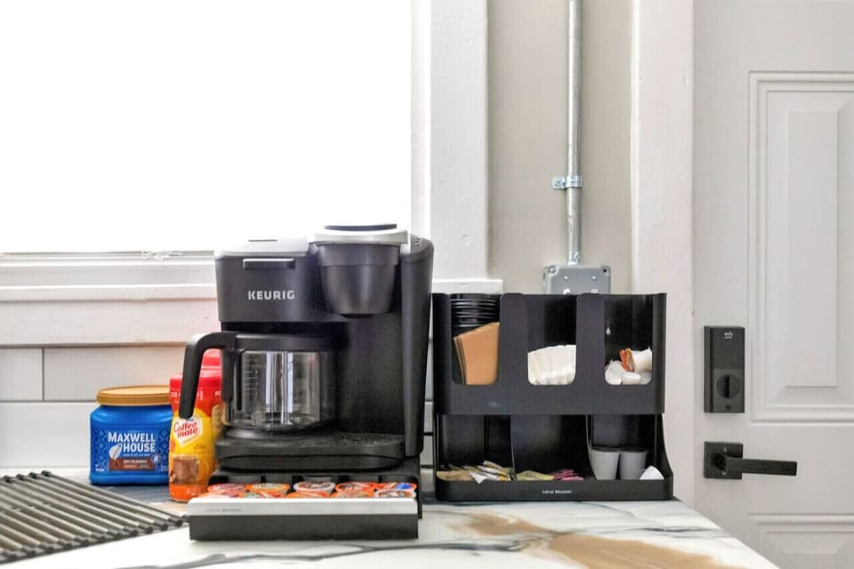 Fully equipped! Cook with ease! Featuring a dual coffee maker, stove, dishwasher, microwave, and all the essentials for your culinary adventures.