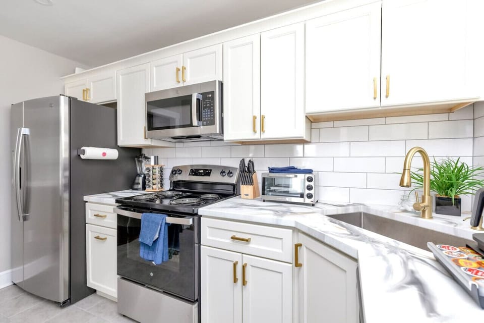 = “Chef’s Chance”  Cook up a feast in the fully stocked kitchen, featuring a dual coffee maker, stove, dishwasher, microwave, and all the spices and essentials for your culinary adventures.