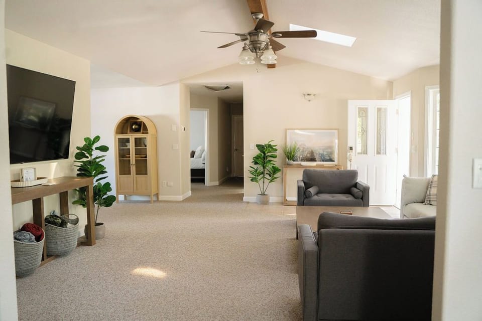 SPACIOUS LIVING ROOM WITH GAME ROOM , SMART TV , EV CHARGER 