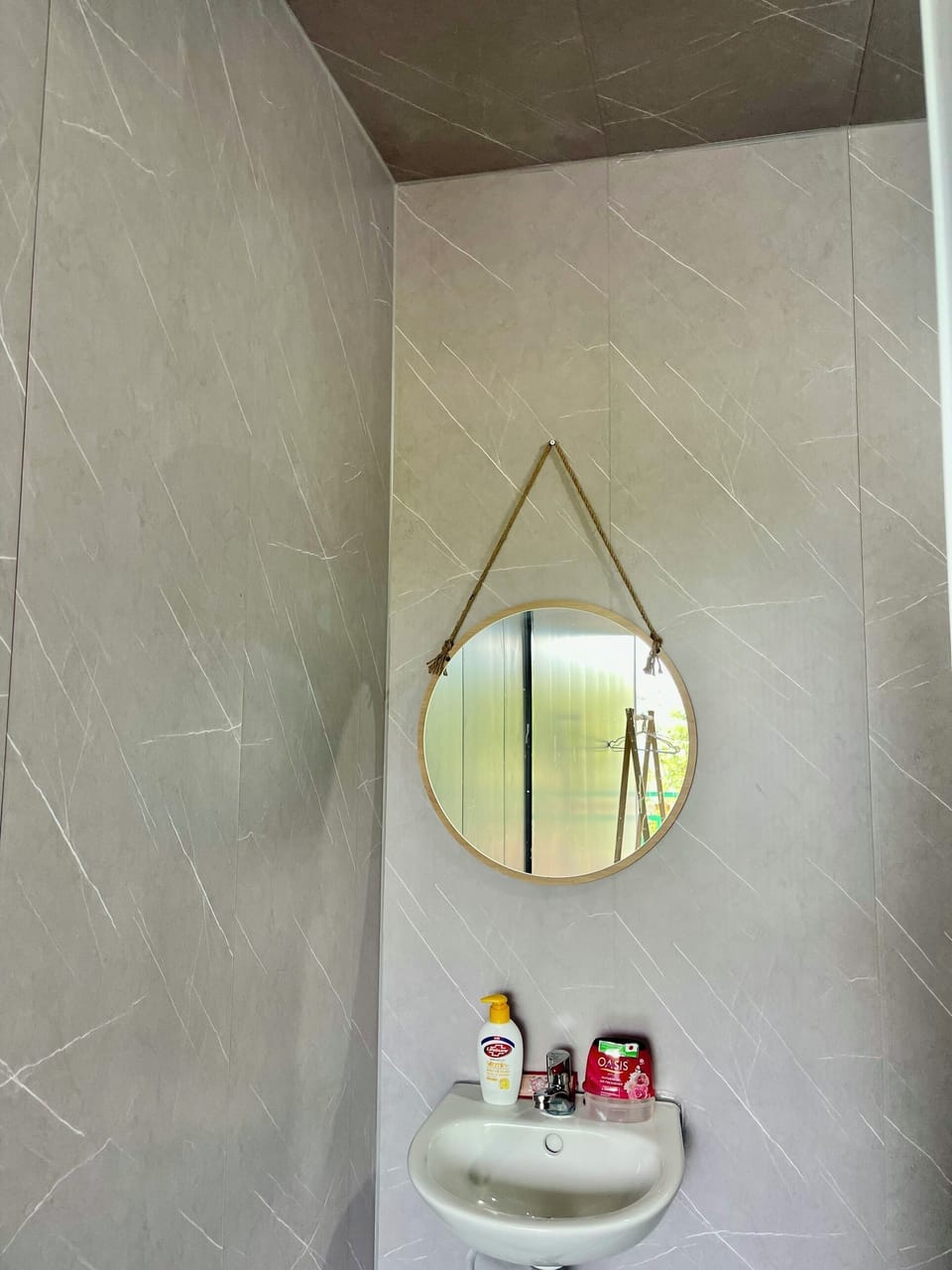 Shower, hair dryer, slippers, towels