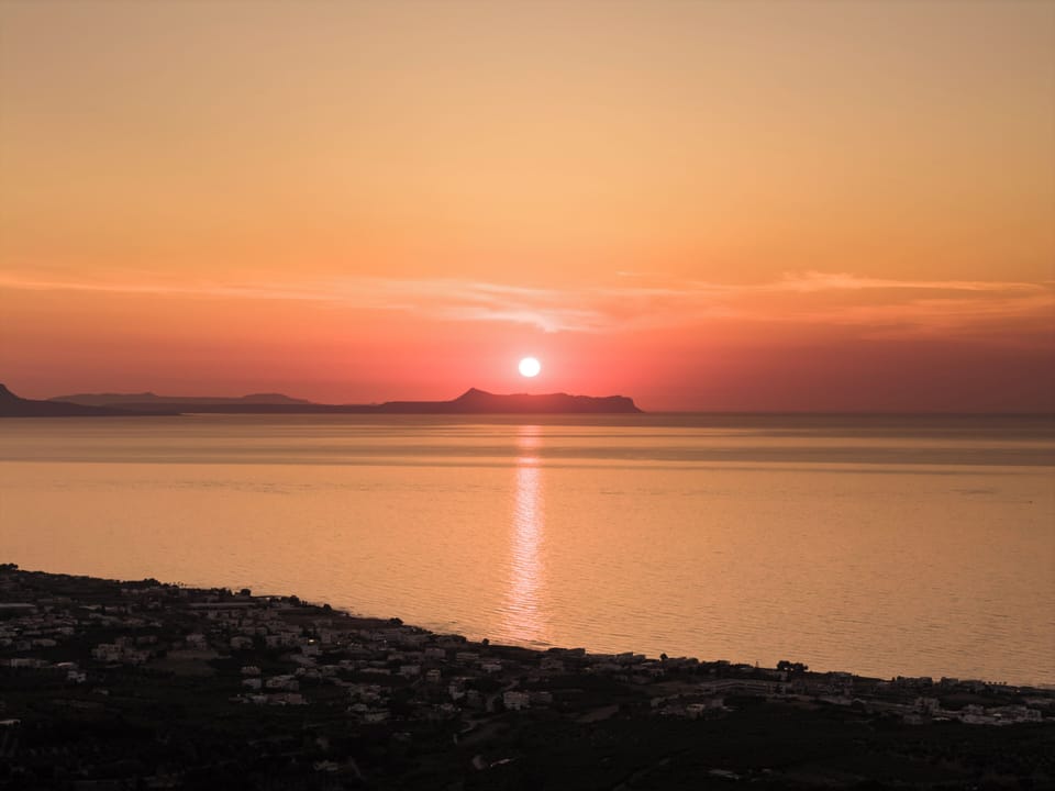 Embrace the vibrancy of rural sunsets at this luxury modern home.