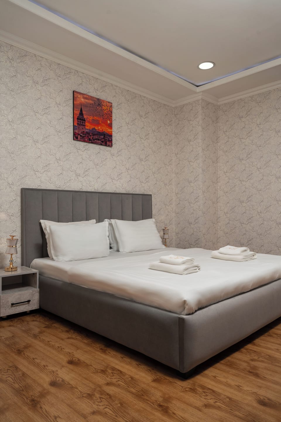 Premium bedding, down comforters, desk, laptop workspace