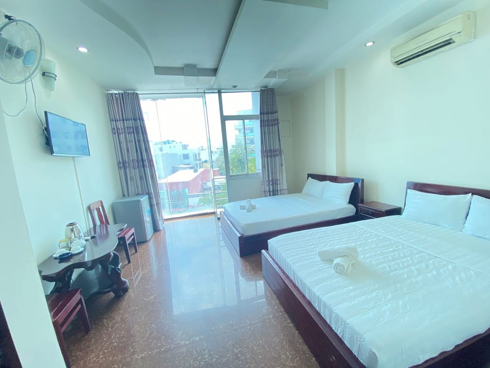 Family Double Room | Premium bedding, pillowtop beds, minibar, blackout drapes