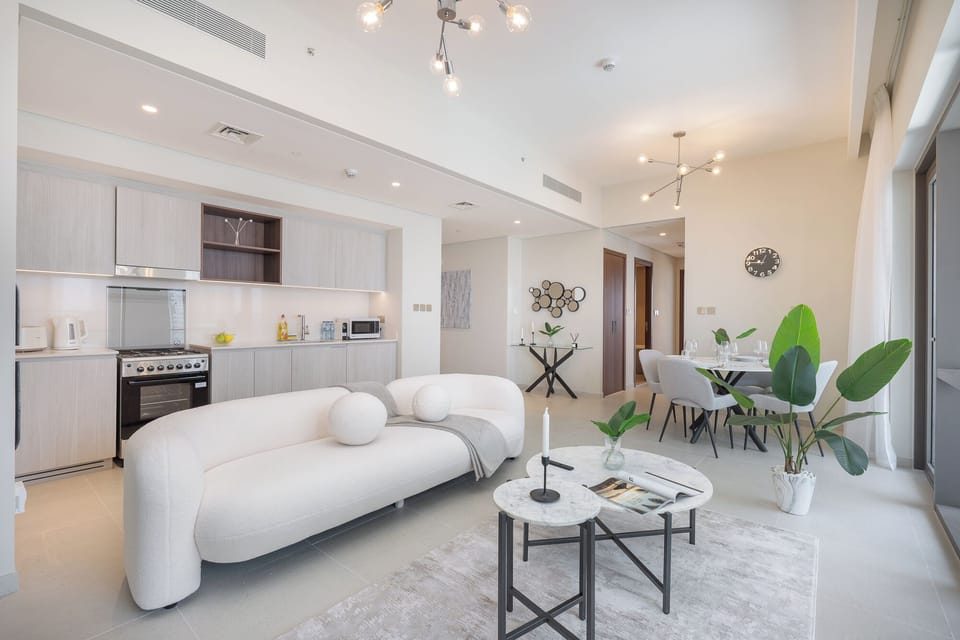 Exclusive Apartment, Balcony, City View | Living area | 50-inch Smart TV with cable channels