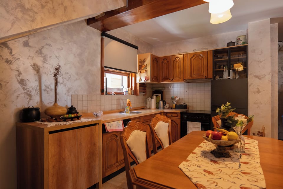 Fairly equipped kitchen with dining area 