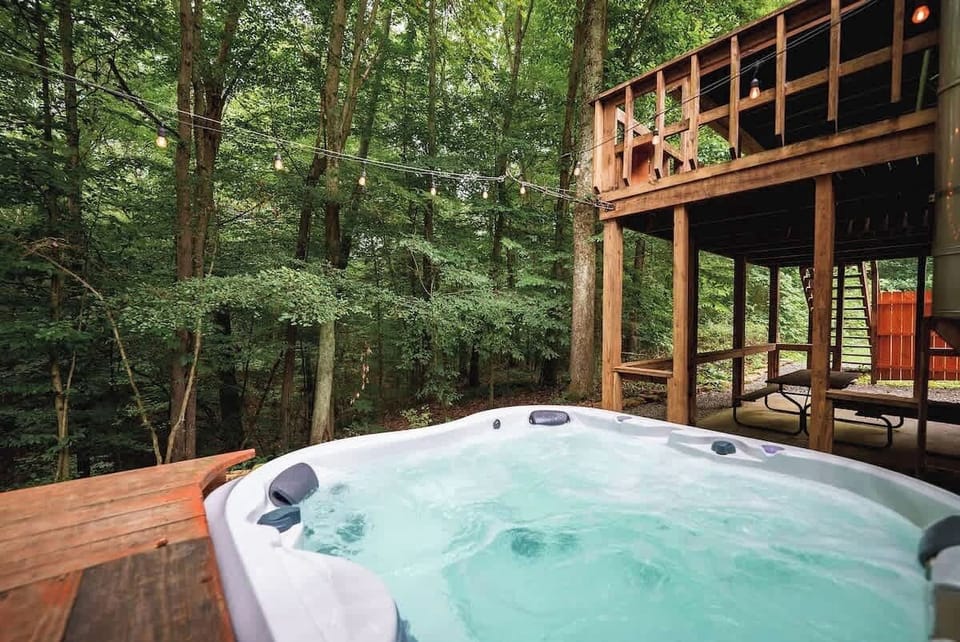 Check out your Jacuzzi hot tub view of the forest at the Art Lodge ! You can finally rest, relax, and recharge.