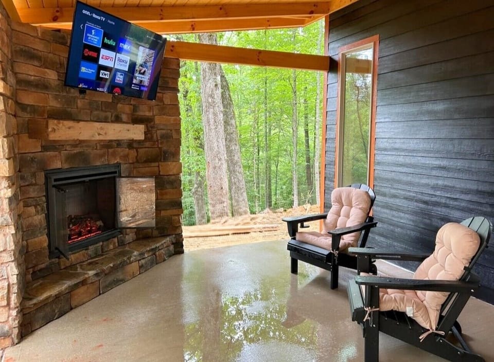 Sit and drink your coffee by the outside fireplace