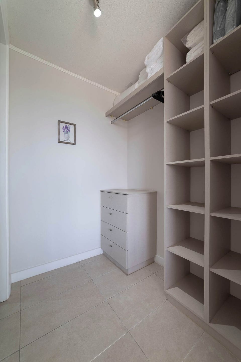 Spacious closet with ample storage for a comfortable stay.
