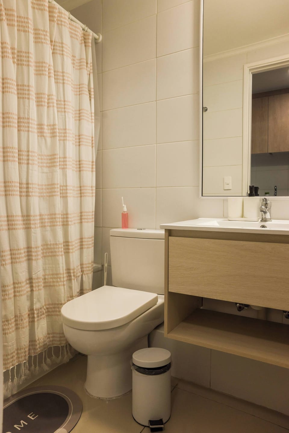 Cozy and clean bathroom with modern fixtures, perfect for a refreshing start to your day.