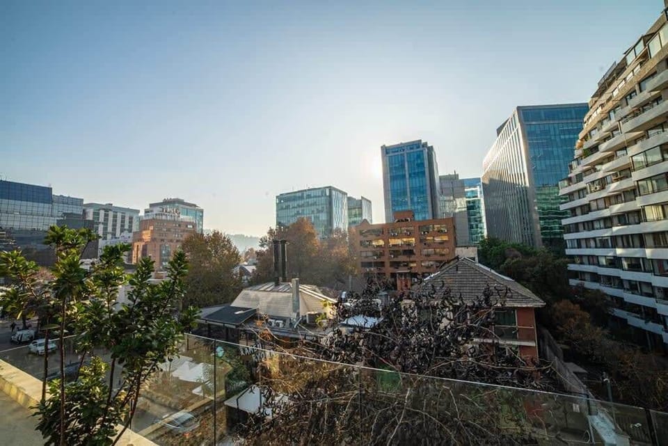 Enjoy stunning city views from your private balcony, perfect for relaxing after a day of exploring Santiago.
