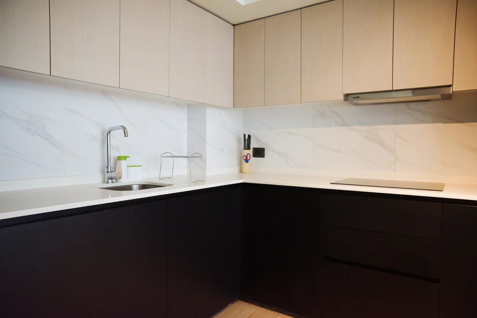 Sleek and modern kitchen with high-end finishes, perfect for culinary enthusiasts.
