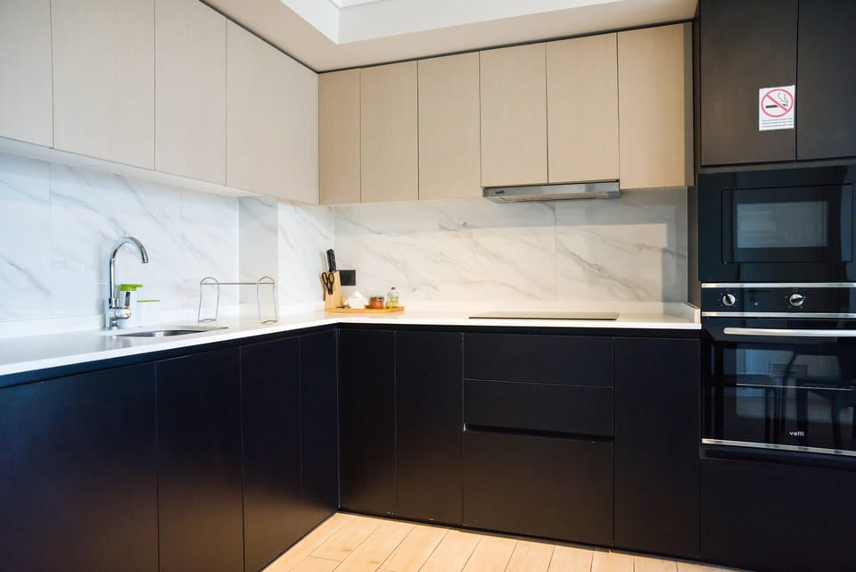 Elegant kitchen with high-end appliances and stylish design, perfect for culinary adventures.