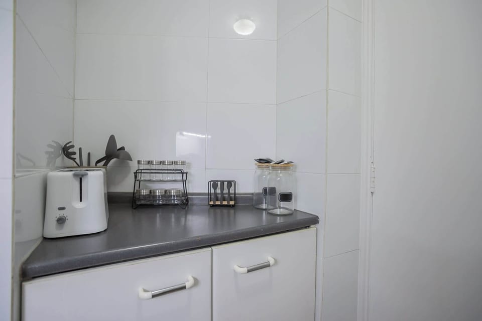 Cozy kitchen corner equipped with essentials for your culinary needs.