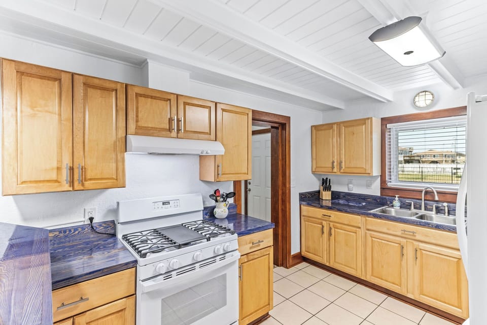Kitchen - This bright kitchen has been recently renovated and is open to the living spaces.