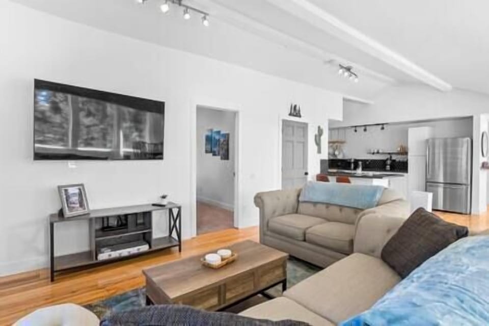 Bright, open living room with Roku TV