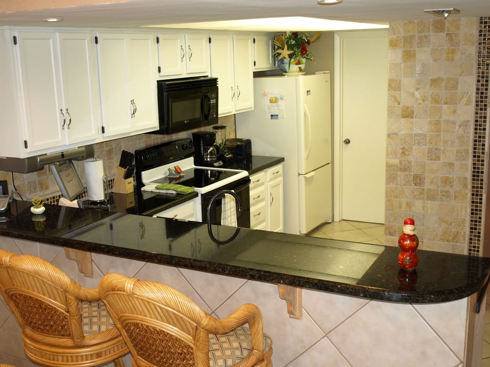 Condo, 2 Bedrooms, 2 Bathrooms, Beach View | Private kitchen | Coffee/tea maker, full-size fridge, microwave, stovetop
