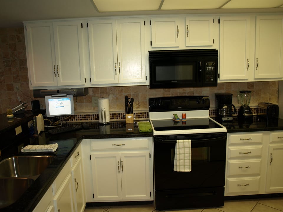 Condo, 2 Bedrooms, 2 Bathrooms, Beach View | Private kitchen | Coffee/tea maker, full-size fridge, microwave, stovetop