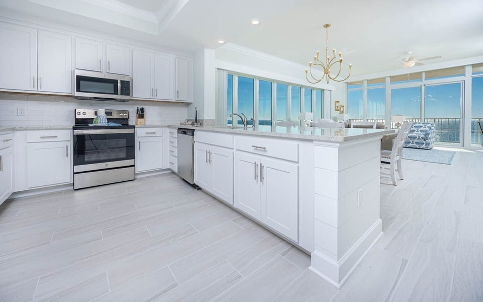 Condo, 4 Bedrooms | Private kitchen | Coffee/tea maker, fridge, oven