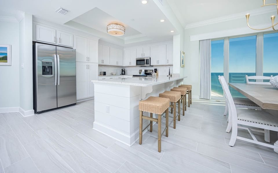 Condo, 4 Bedrooms | Private kitchen | Coffee/tea maker, fridge, oven