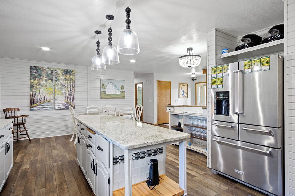 Full kitchen equipped with all essential cooking and eating needs.