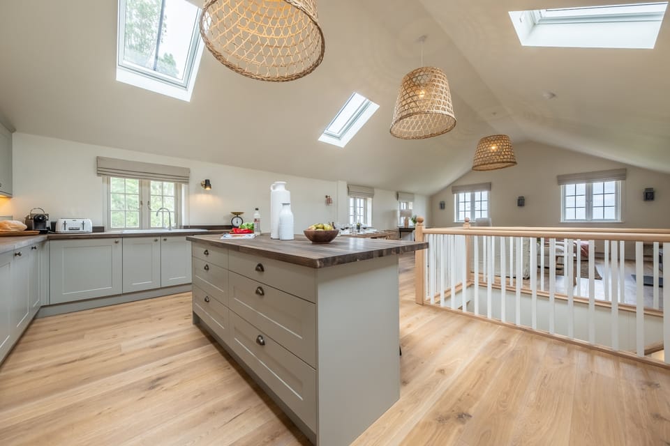 First floor: Kitchen with island/ breakfast bar