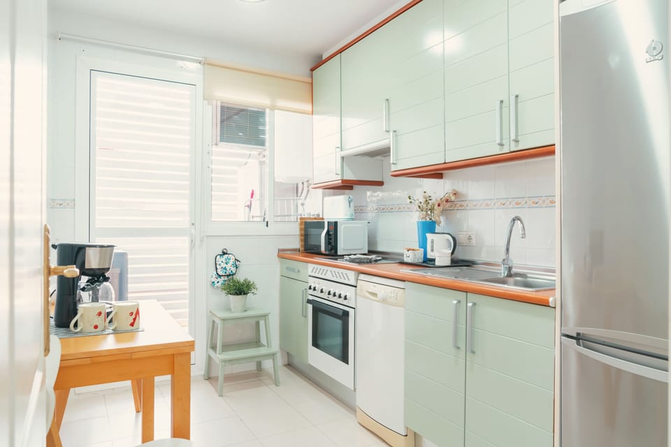 Family Apartment, 2 Bedrooms | Private kitchen | Full-size fridge, microwave, oven, stovetop