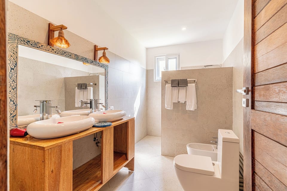 Shower, rainfall showerhead, designer toiletries, slippers