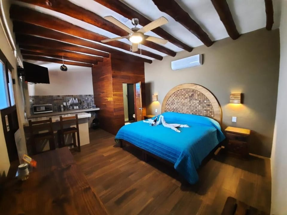 Deluxe Studio Suite, Pool View | Individually decorated, individually furnished, free WiFi, bed sheets