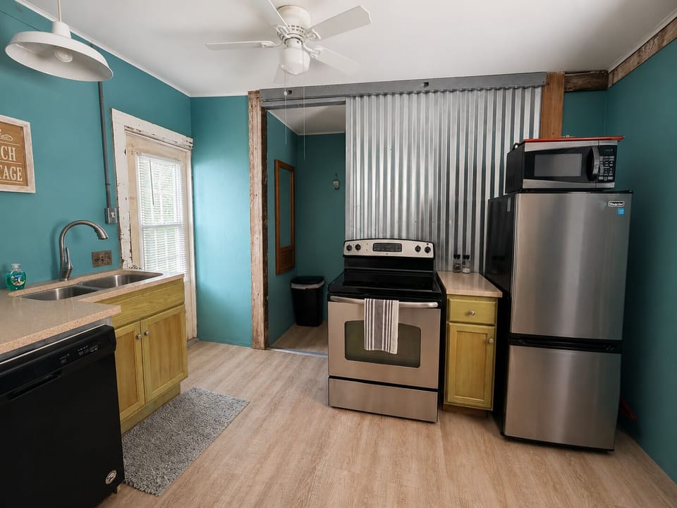 Prepare a home cooked meal in the full kitchen.
