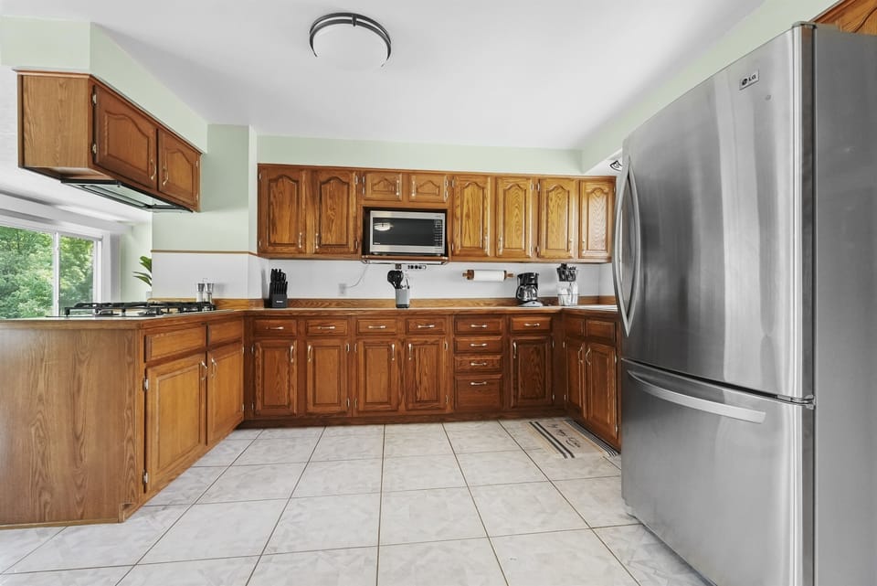 Kitchen: Whip up culinary delights in this spacious, well-equipped chef’s kitchen!