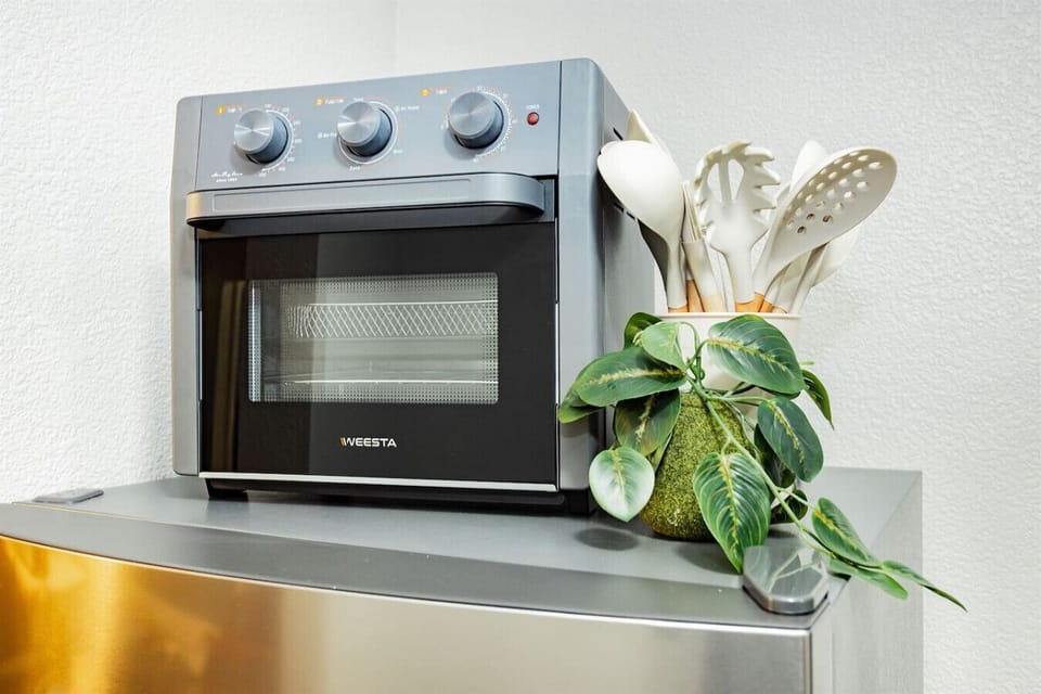 Kitchen Haven: Unleash your inner chef with this stylish air fryer and gourmet tools!
