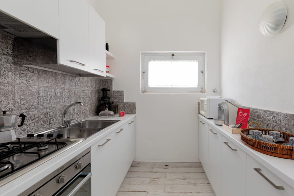 Apartment, Sea View | Private kitchen | Espresso maker