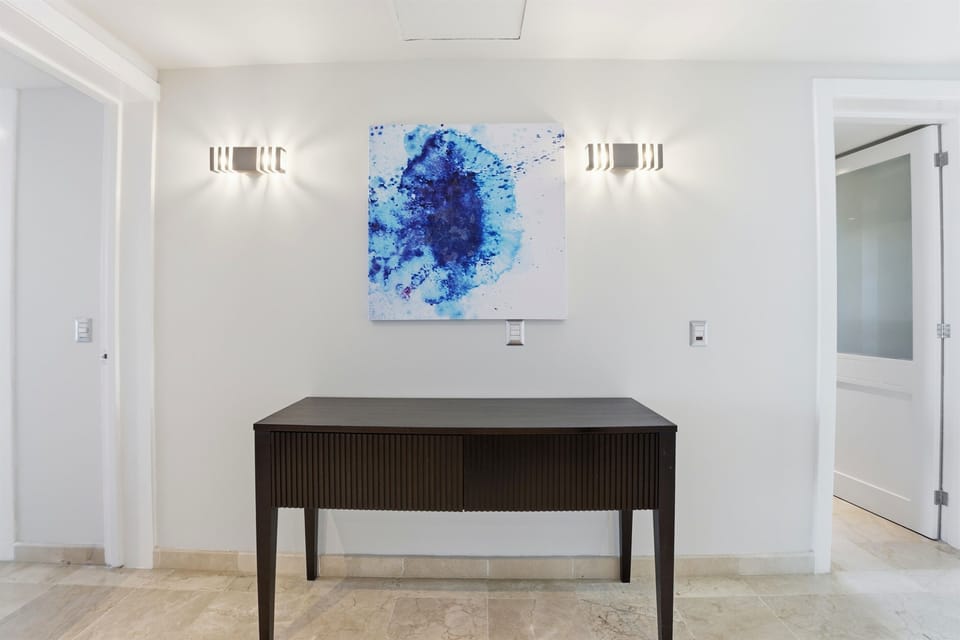 A stylish interior detail with modern artwork, adding a refined and elegant touch to the space.