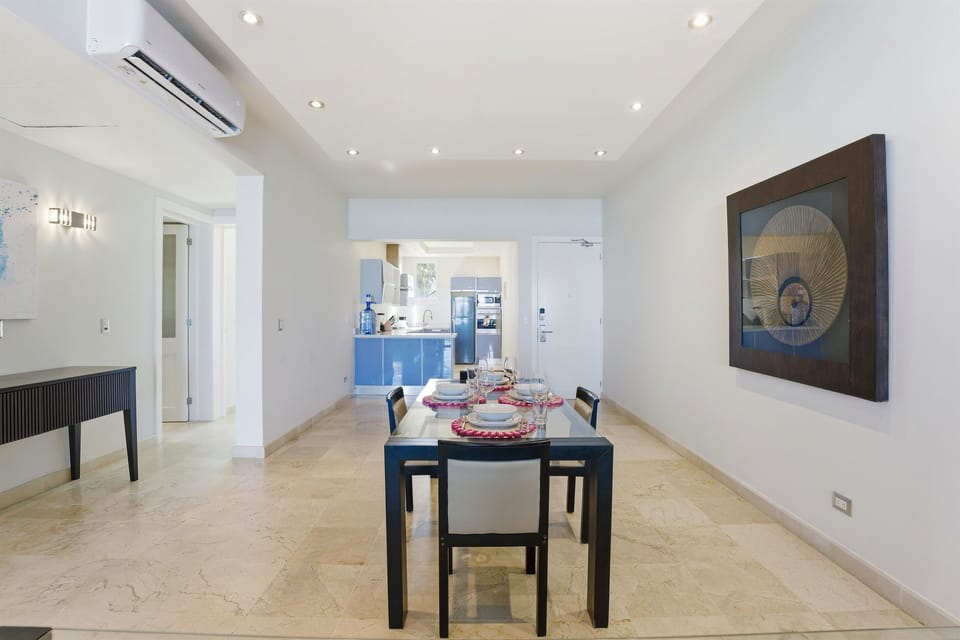 A welcoming entry that opens into the dining and living areas, offering space, light, and a modern feel.