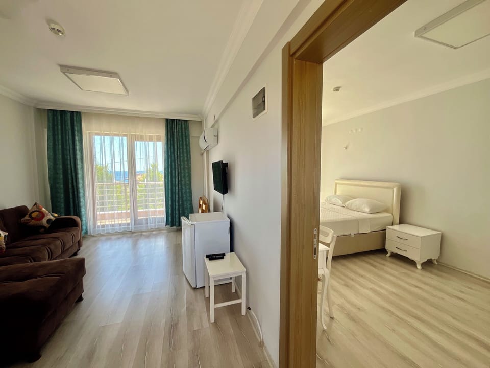 Standard Suite, Balcony, Sea View | 1 bedroom, premium bedding, free WiFi, bed sheets