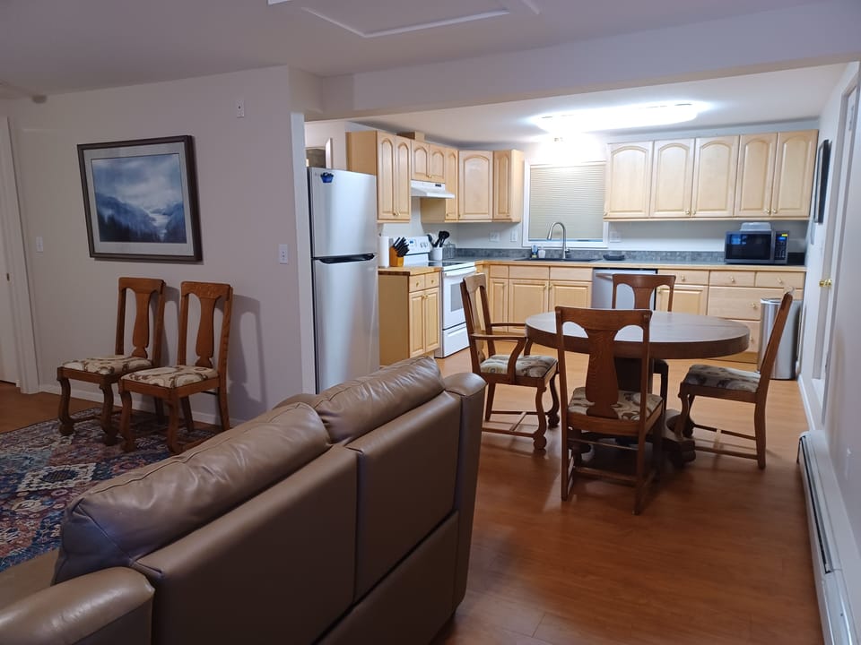 Entry to Living room, dining room, and kitchen.
