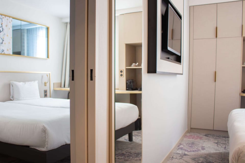 Premium bedding, desk, laptop workspace, soundproofing