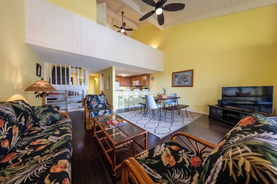 Open floor plan with cathedral ceiling