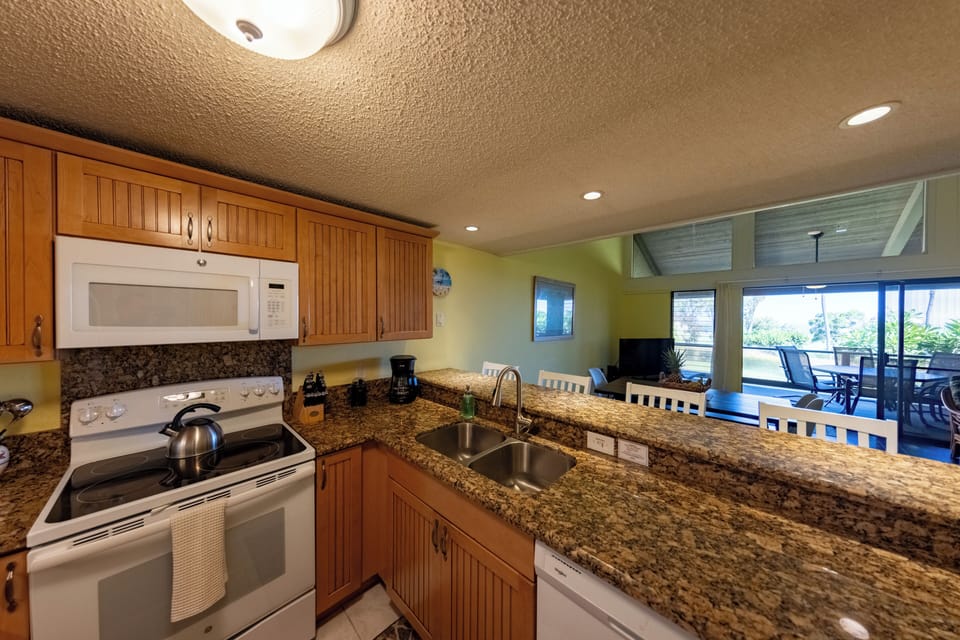 Kitchen is stocked with everything you need for cooking meals 