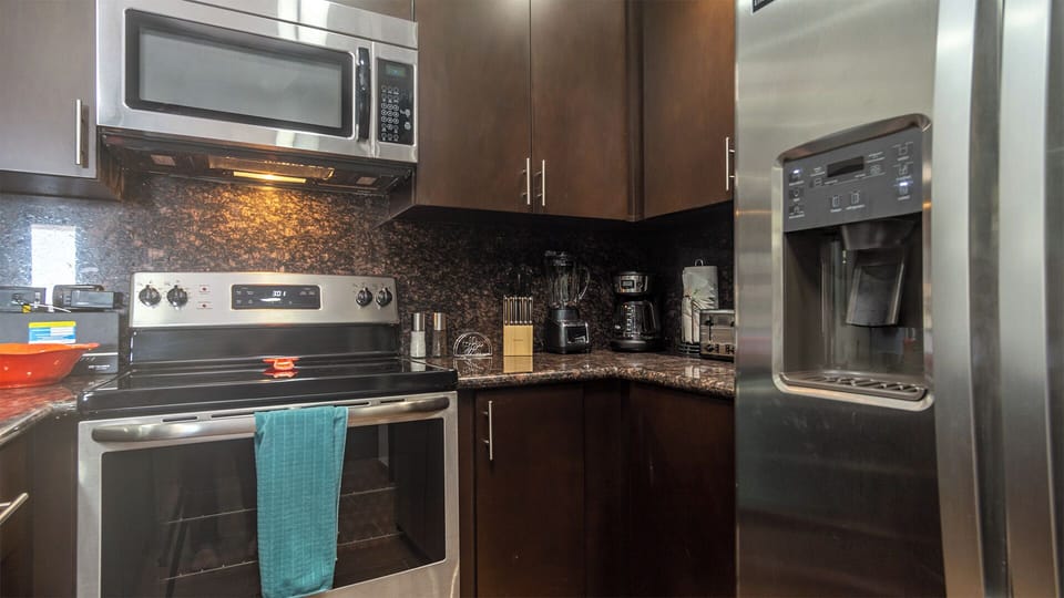 Close up of small appliances on counter top in kitchen
