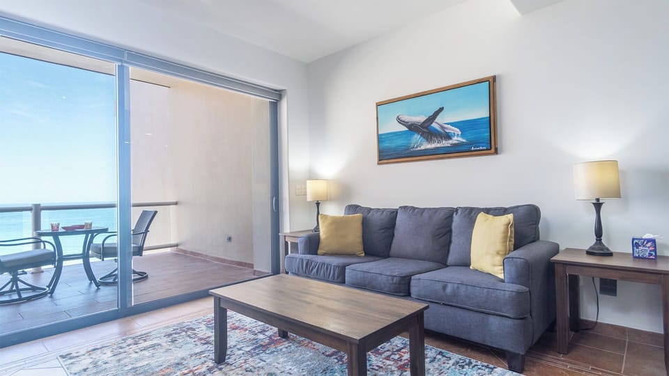 Sofa in living room with table on the balcony